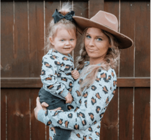 Mother and daughter matching outfits-Mum and daughter wearing matching Leopard long sleeve sweaters