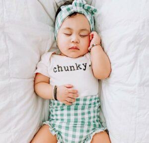 Finn Rmma Review-Sleeping baby wearing organic Chunky onesie