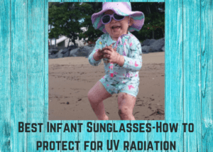 Best infant sunglasses-Baby on the beach wearing Cancer Council sunglasses