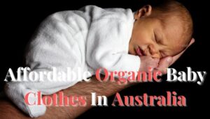 Affordable organic baby clothes in Australia.-Baby sleeping on daddy's arm.