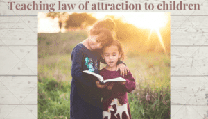 Teaching law of attraction to children-Two young girls reading happily outside in the sunshine