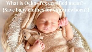 What is Oeko-Tex certified mean? Sleeping newborn baby holding a soft toy