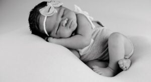 Justcutebabyclothes.com header-baby in cute outfit.