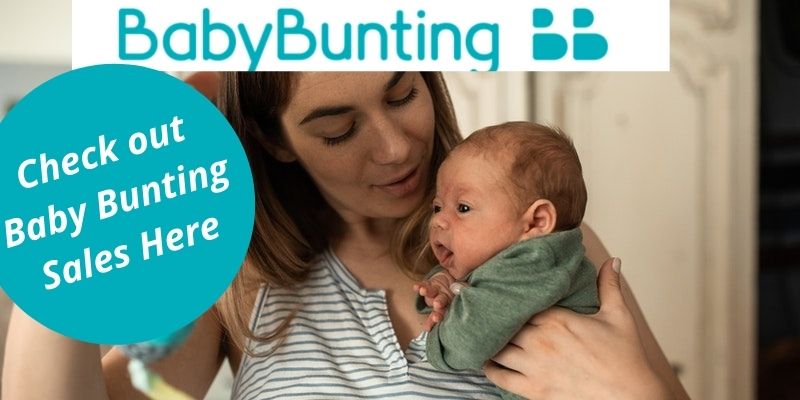 Does Baby Bunting Have Sales?-Women holding a baby and a sign that refers to Baby Bunting sales.