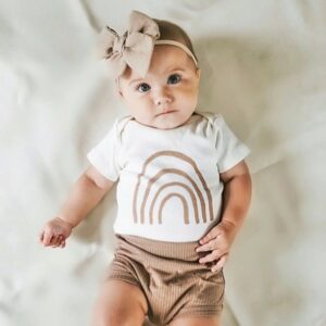 Best newborn graphic onesies-Baby wearing Newborn outfit Tenth and Pine.