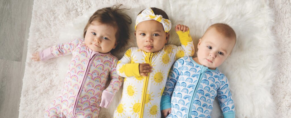 Bellabu Bear VS Little Sleepies.-3 babies wearing Little Sleepies outfits.